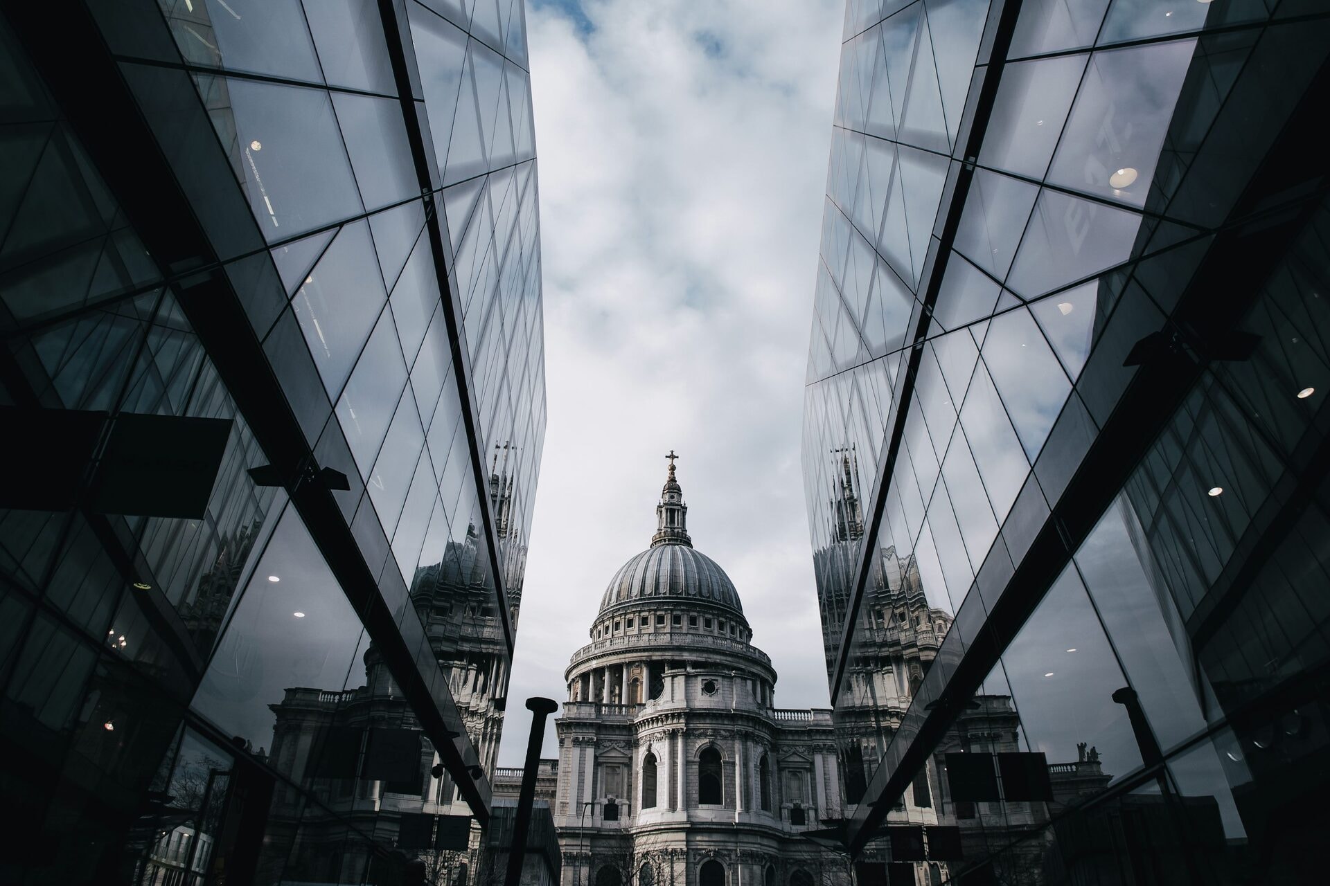 St Paul's Cathedral framed and reflected between the glass facades of One New Change