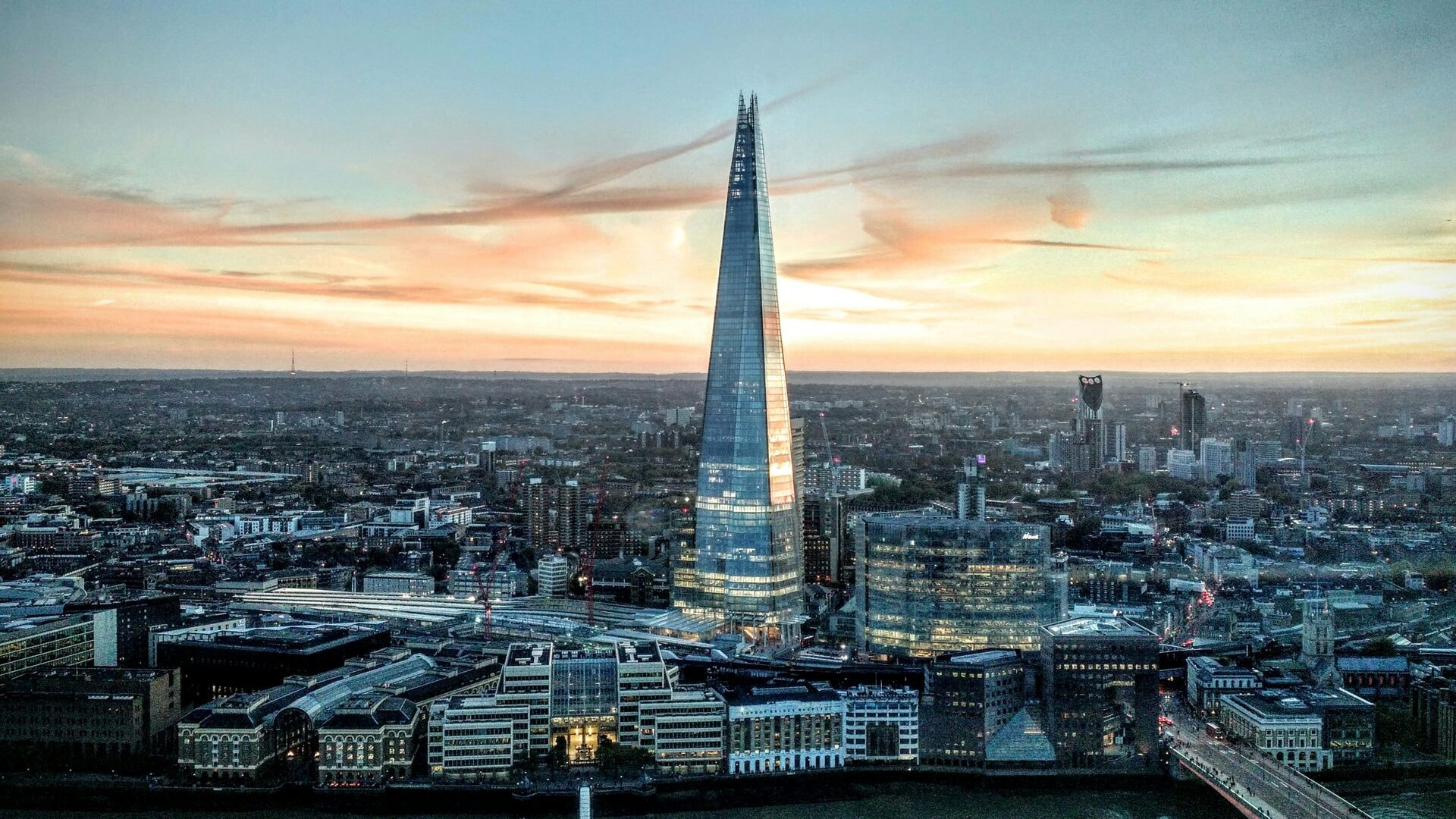 The Shard rising above the London skyline at sunset